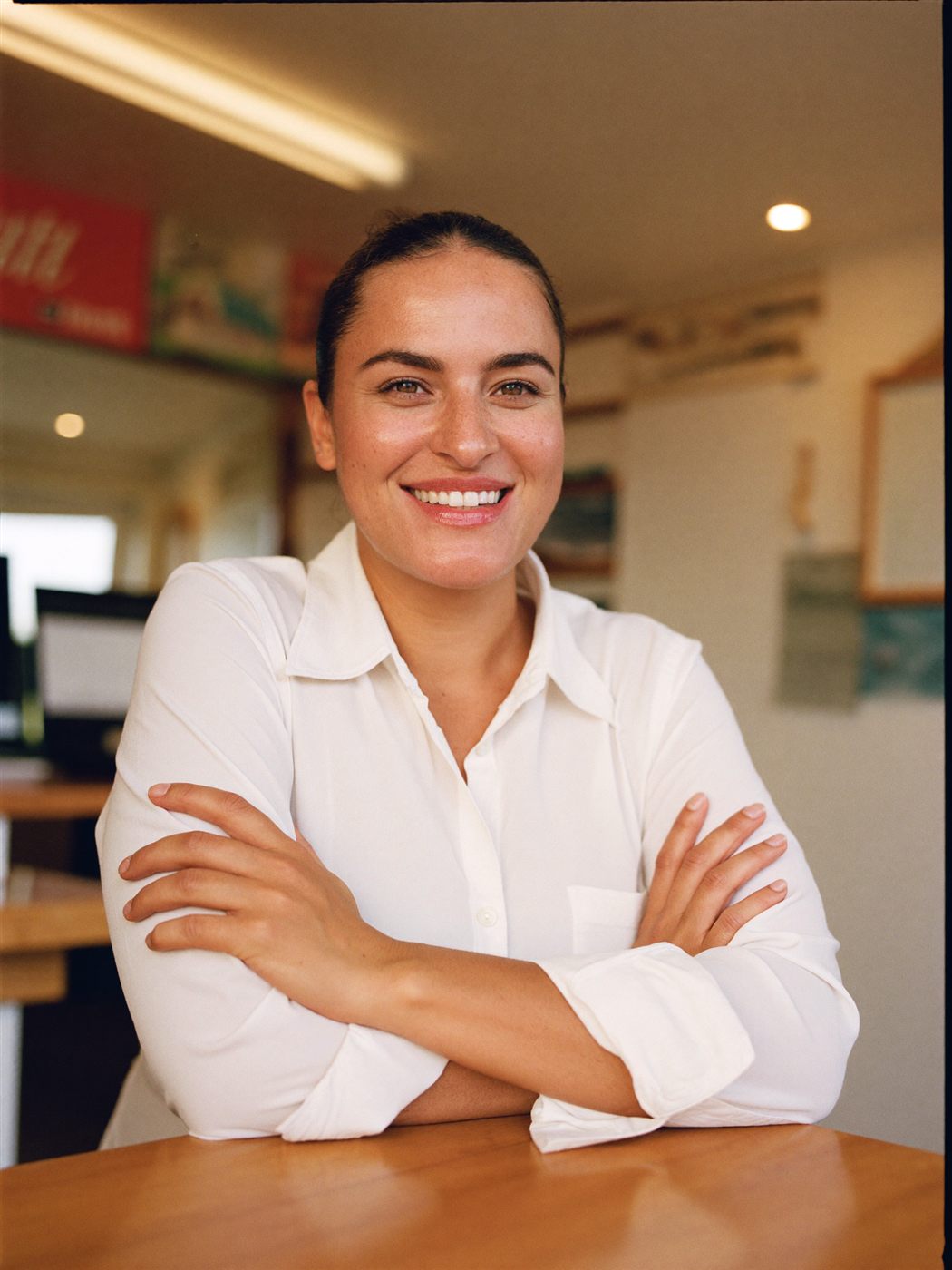Dueña del negocio en su oficina